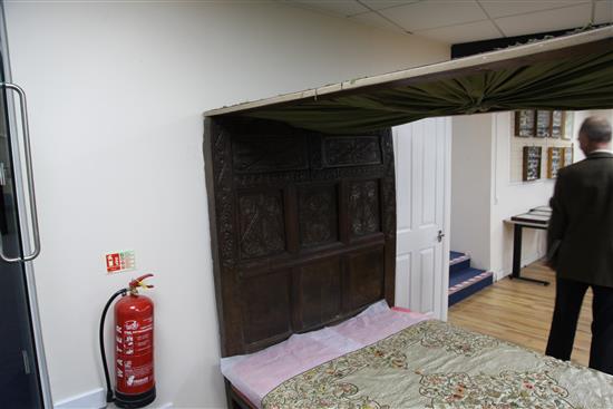 A 17th century carved oak tester bed, W.4ft 6in. H.6ft 1in. L.7ft 2in.